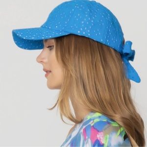 Cute eyelet hat with bow in the back.